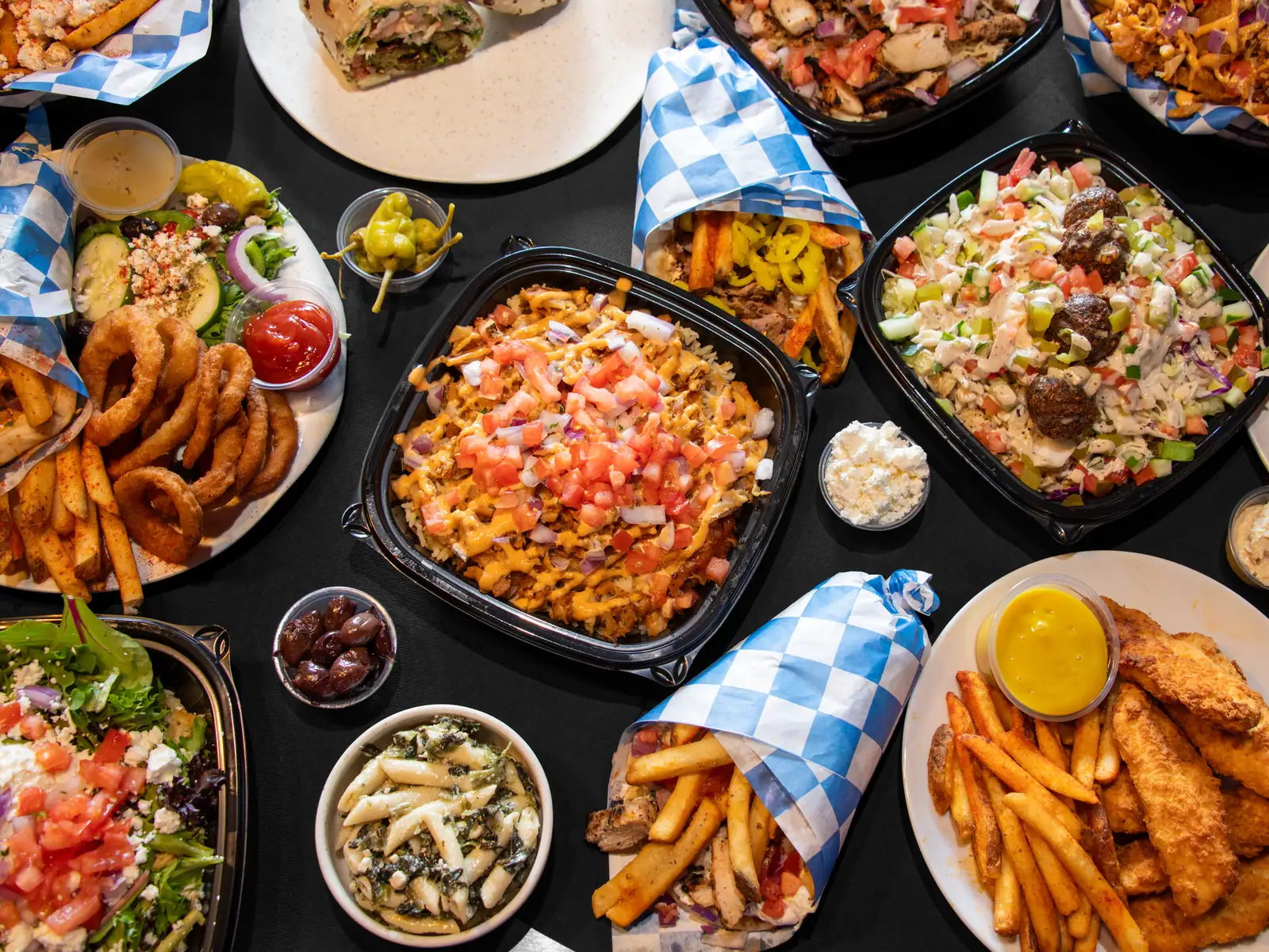 Gyros, Greek salads, loaded fries and spreads from The Gyro Spot in Manchester, NH