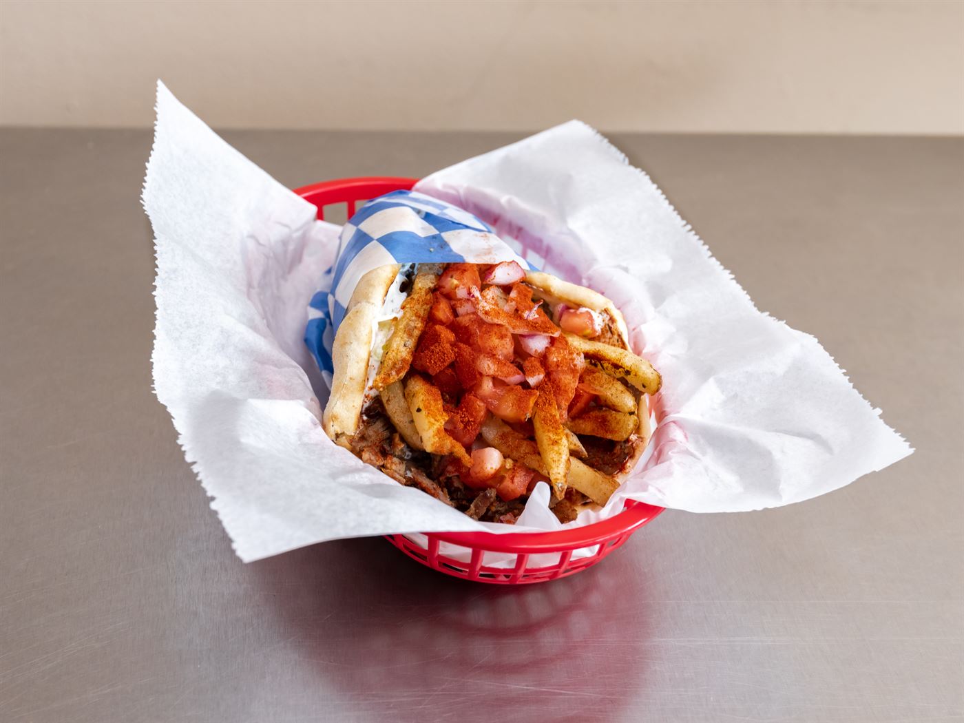 Lamb gyro with fries and tomatoes